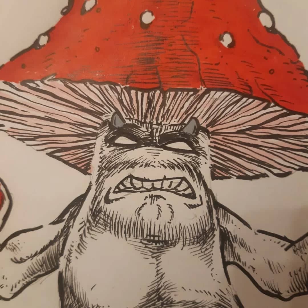 Créature ailée au chapeau rouge