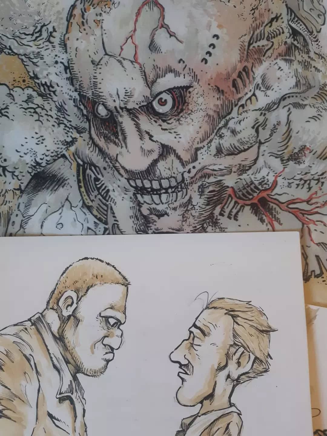 Crâne monstrueux et portraits en encre